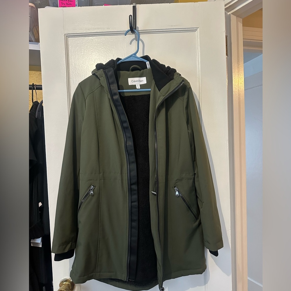 Green rain jacket with fleece